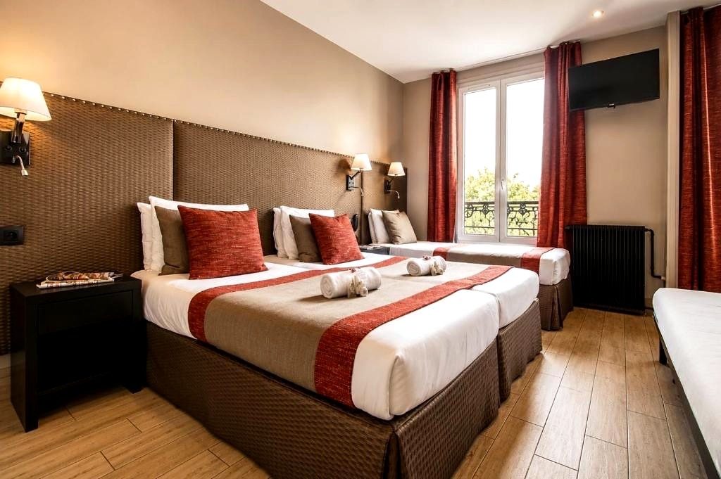 Chambre quadruple de l'Hôtel Migny à Pigalle