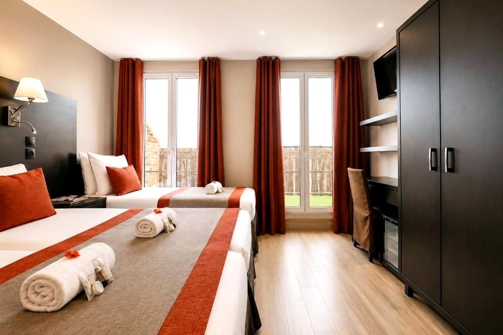 Chambre triple Hôtel Migny à Pigalle